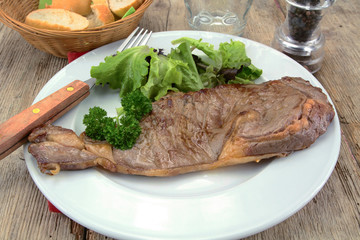 steak of grilled beef on a plate