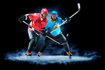 ice hockey players isolated on black background
