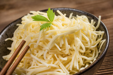 Bowl of cooked noodles.
