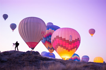 Fototapeta premium Hot air balloons flying at the sunrise at Cappadocia