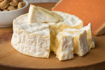 French Camembert cheese on a cutting board