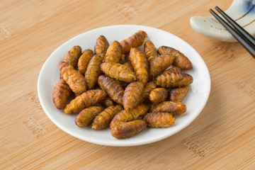 Dish with crispy silkworms