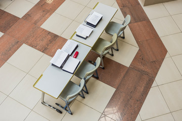 table with papers and diplomas. white papers and documents on wooden tables.