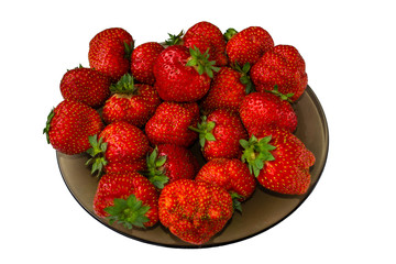 Fresh strawberries in black plate