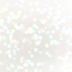 Subtle pastel shiny confetti pattern. Christmas sparkling texture. New year white bokeh background. Light winter holiday glitter background. 