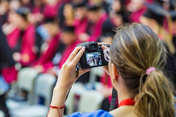 display of small and old photo and video camera with natural light. a parent, friend and...