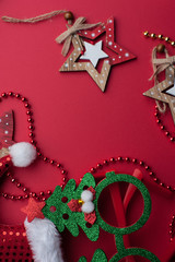 Christmas Headband, Funny Glasses With Green Trees and Wooden Toys on Red Background.