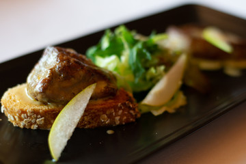 pan fried goose liver foie gras with apple slaw salad on the side