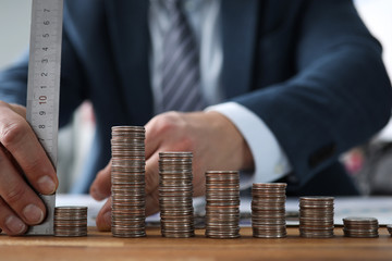 Adult counting saved cash