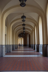 Obraz premium corridor arcade with lamp Salerno, Italy, italian architecture