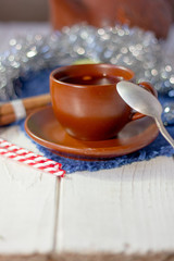 Beautiful christmas tea on white wooden table.