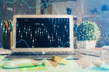 Multi exposure of forex chart and work space with computer. Concept of international online trading.