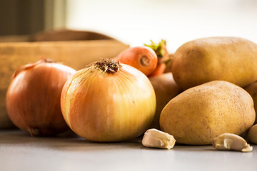 onion potatoes and carrots close up root vegetable