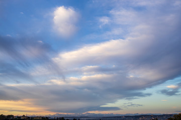 white and grey clouds in a blue sky