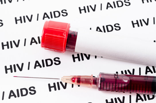 Sample blood for HIV test in syringe.