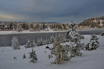 Russia. Mountain Altai, early winter morning in the village of Kebezen on the Bank of the Biya river