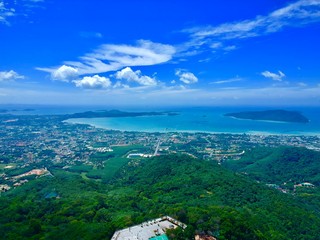 Drone panorama Aerial Views of Big Buddha Phuket Thailand kata and karon beach in background turquoise waters 