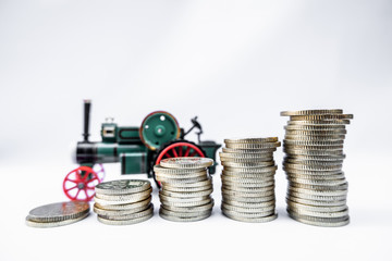 Toy cars with gold coins show To growth, saving money for car loans