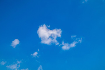 Blue sky with clouds on a clear day and good weather in the morning, fluffy and soft white clouds