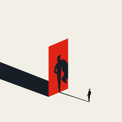 Businessman looking at his superhero shadow vector concept. Symbol of ambition, career progress, motivation. © jozefmicic