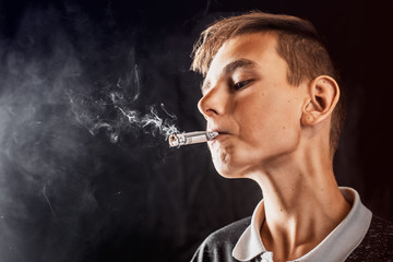 A teen Smoking a cigarette or drugs is a rolled dollar, the concept of teen addiction and spending...