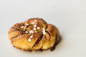 Swedish cinnamon bun with pearl sugar.