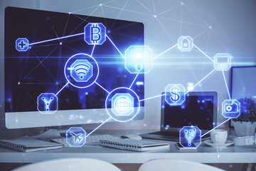 Computer on desktop with social network theme icon. Multi exposure. Concept of international connections.