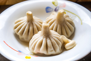 delicious dumplings are cooked in a saucepan