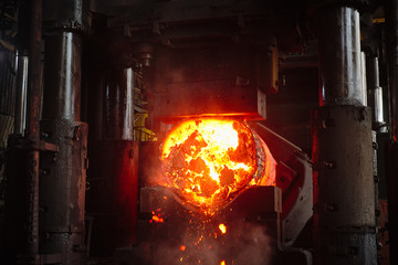 Forging a workpiece on a forging press. Forging production.