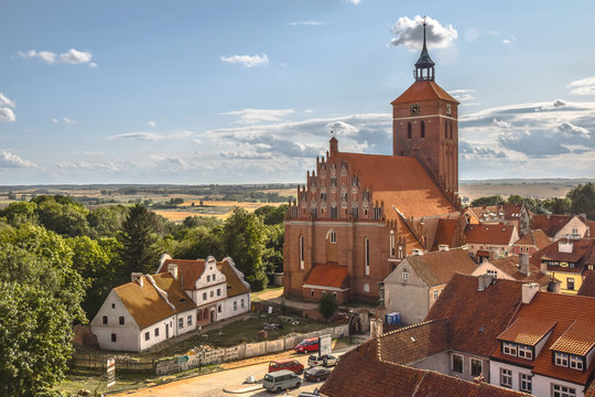 Parish church of Saints Peter and Paul the Apostles and old presbytery in Reszel, Warmian-Masurian Voivodeship, Poland.