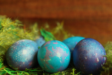 Space galactic blue Easter eggs in nest