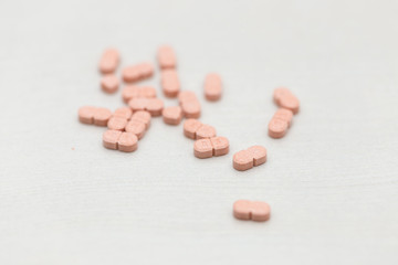 Colorful medical pills on the table, for your text