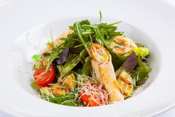salad with stuffed pancakes and greens