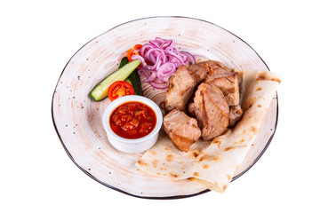 Shashlik pork with ketchup and vegetables