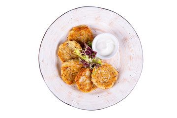 Pumpkin oladas, served with sour cream