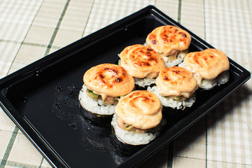 Delicious set of rolls of rice and fish.