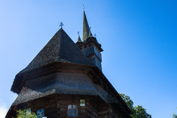 Fototapeta na wymiar The Unesco wooden church from Budesti (Maramures/Transylvania/Romania) 