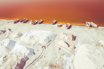 Aerial view of the Pink Lake Retba or Lac Rose in Senegal. Photo made by drone from above. Africa Natural Landscape.