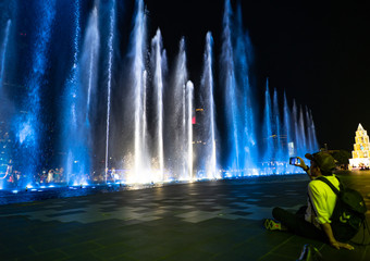 The colorful fountain on the lake at the Waterfront in the city