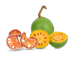 Aegle marmelos and Dry bael fruit on white background