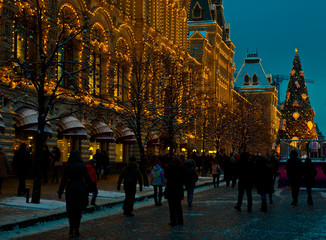 Night view of State Historical Museum building and  Kremlin passage/ A snowy evening in the city/ Moscow/ Russia.