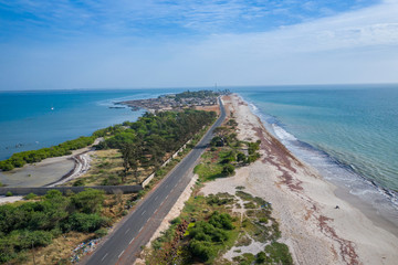 Aerial view of Atlantic coast near Palmarin. Saloum Delta National Park, Joal Fadiout, Senegal. Africa. Photo made by drone from above.