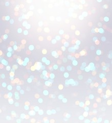 Snow bokeh brilliance abstract pattern. Christmas white silver glare background. New year's lights decoration. Pale pearl glow texture. Iridescent gleaming winter backdrop. Festive sparkle template.