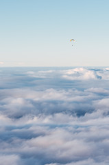 paratrooper flying above the clouds