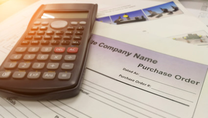 Fill in the purchase items in an order form,Close up of purchase order form with pen / selective focus