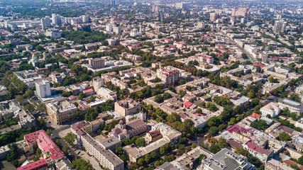 Aerial view to Odessa, roofs, port and sea from above