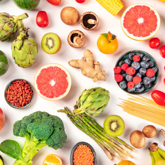 Vegan food. Healthy diet concept. Fruits, vegetables, pasta, nuts, legumes, mushrooms, overhead square shot on a white background. A flatlay composition