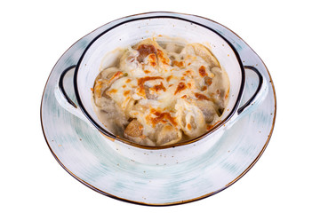 Dumplings under cream sauce