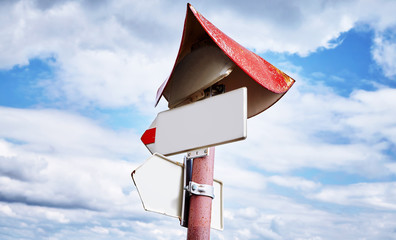 Empty white sign information direction simple notice board. Signpost inform guide on cloudy blue...