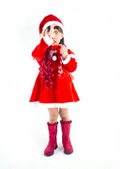 Asian girl is wearing a Santa costume to celebrate Christmas. White background